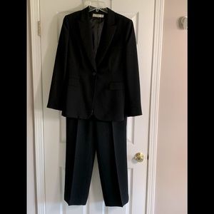 2 piece Black Tahari Size 10 Suit. Never Worn. Original Tags